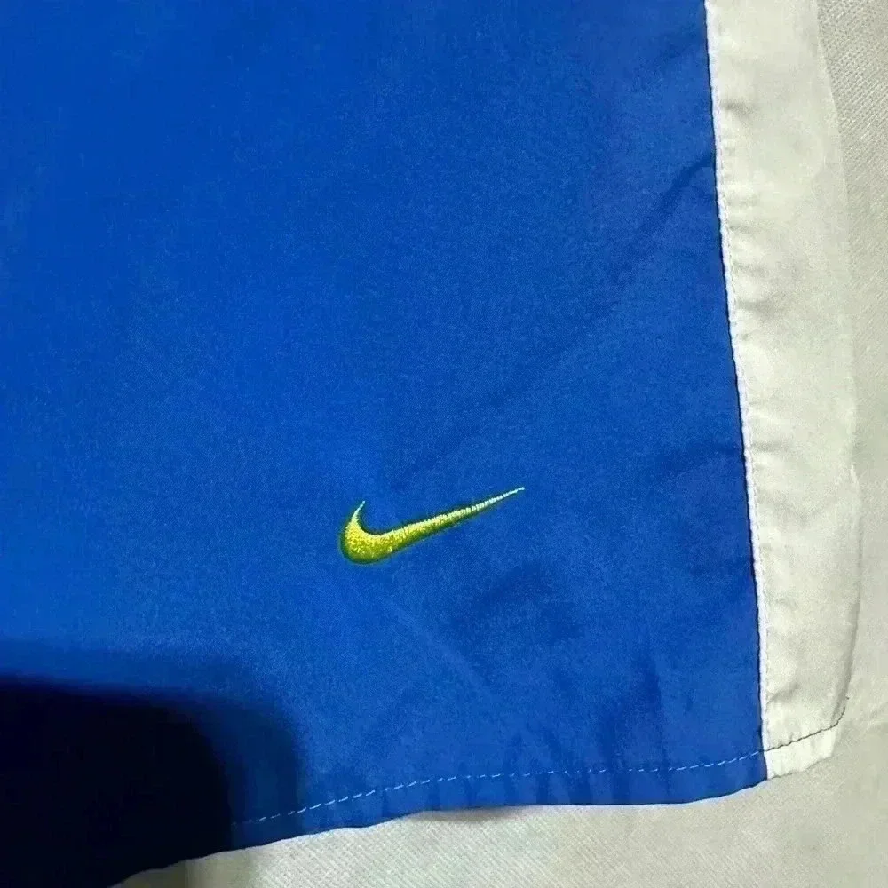 Women’s Nike Dri-Fit Running Shorts Blue White Sz Medium Neon Swoosh Logo Lined